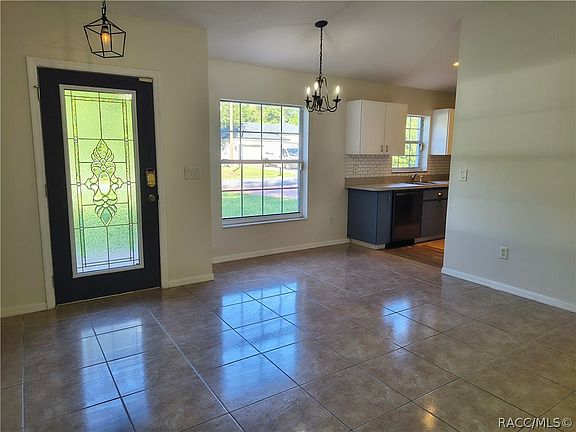4th image of 7999 N Merrimac Way