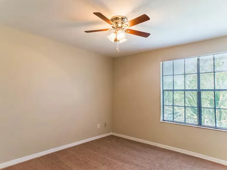 7667 N Wickham Rd — Photo 10