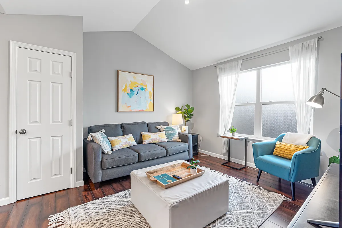 A cozy couch and living room await! - 4414 Marathon Blvd #B