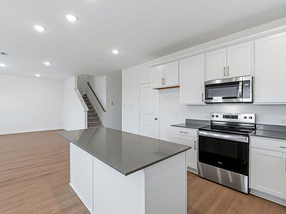 Representational Photo- Kitchen Open to the Gathering Space