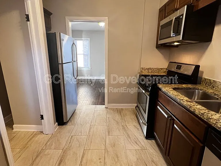 9121 S Utica Ave — Photo 7