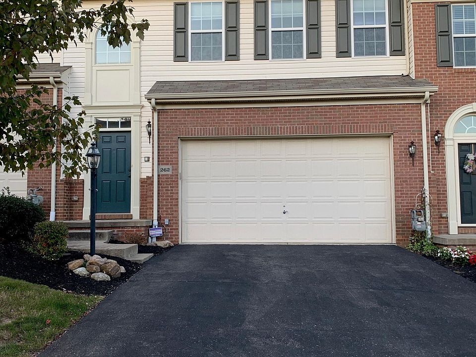 Front of house. 2-Car Garage. Driveway easily fits 4 vehicles.