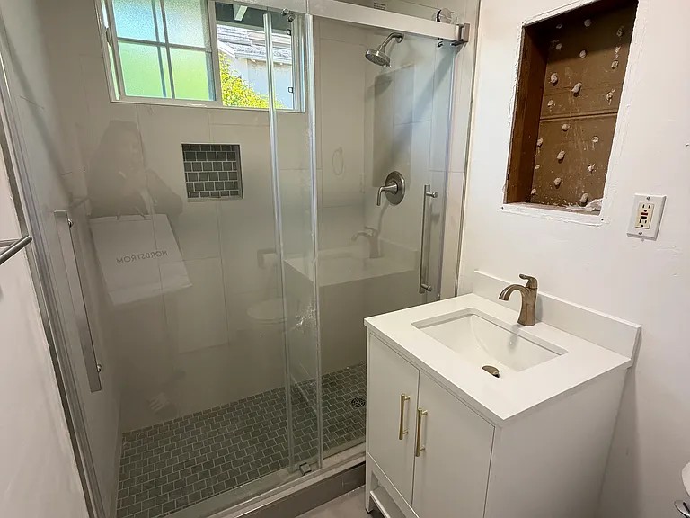 Remodeled Bathroom, Medicine cabinet installed this week. New floors, shower tile, doors, toilet, all new!