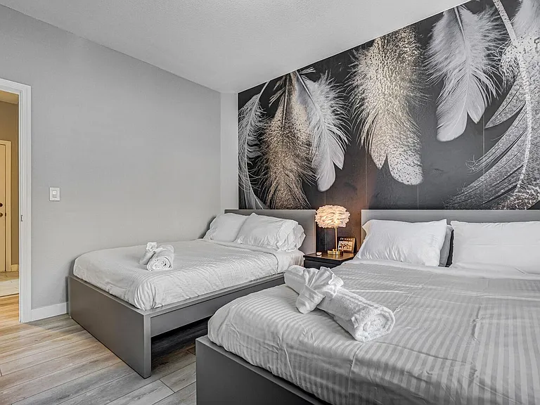 Main level bedroom with two full sized beds!