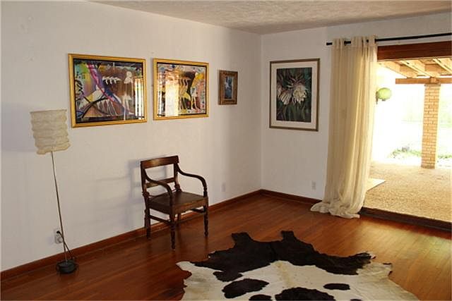 Formal Living Room with doors leading to back patio
