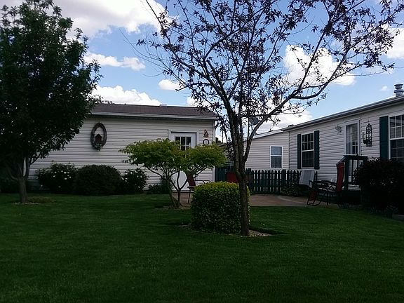 Back of Home With Garage 