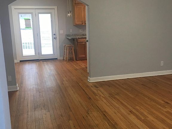 Looking into the house from the front door. Living room into