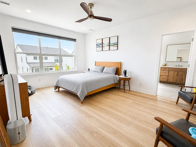 Master Bedroom - Spacious Retreat with Motorized Blackout Shade and Ceiling Fan