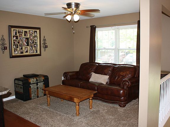 living room beside kitchen