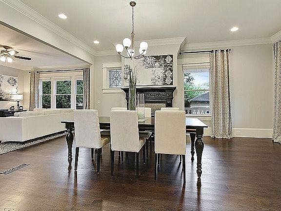 Large dining room features fireplace