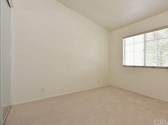 Master bedroom and 1 of 2 mirrored closets