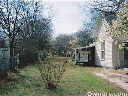 View from street showing 2 ac. prop. depth