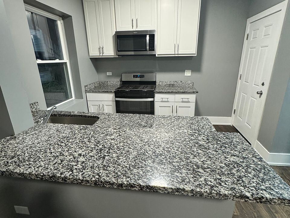 1st image of 6950 S Oglesby Ave APT 1