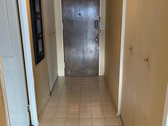 Entry foyer with two closets