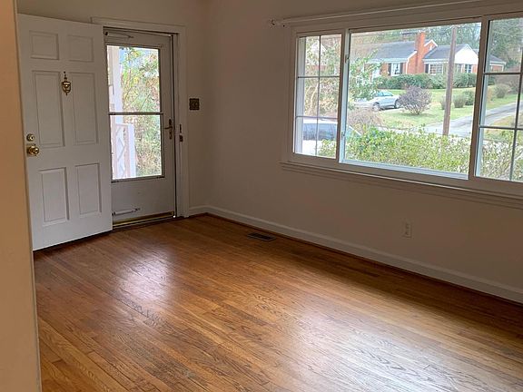 Main living area and front door looking towards front yard