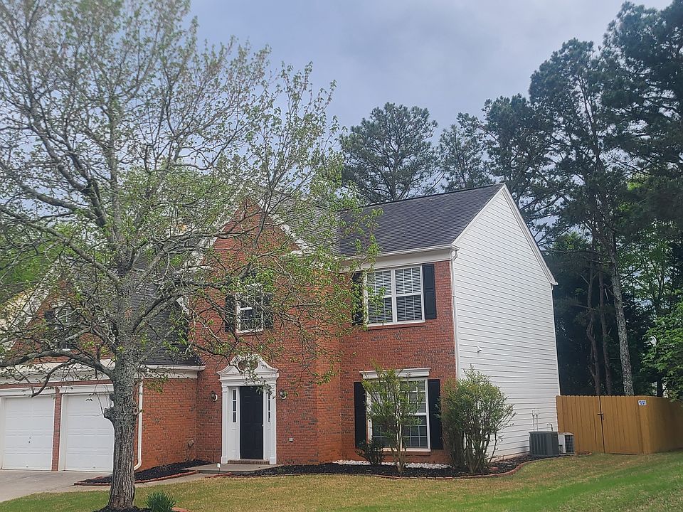 Front view with gated fence