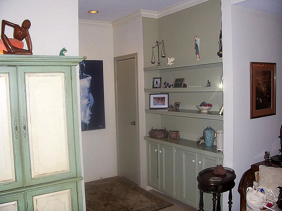 As you walk in and step into the Foyer, these wonderful Built Ins greet you while you gaze on the op