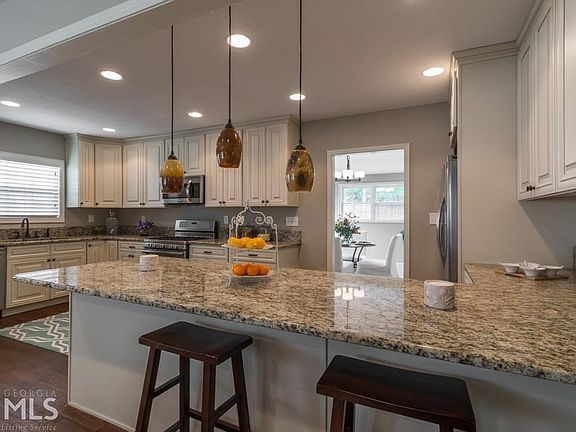 Your Dream Kitchen for under $400k.....features 42" solid wood cabinetry, granite countertops, MASSI