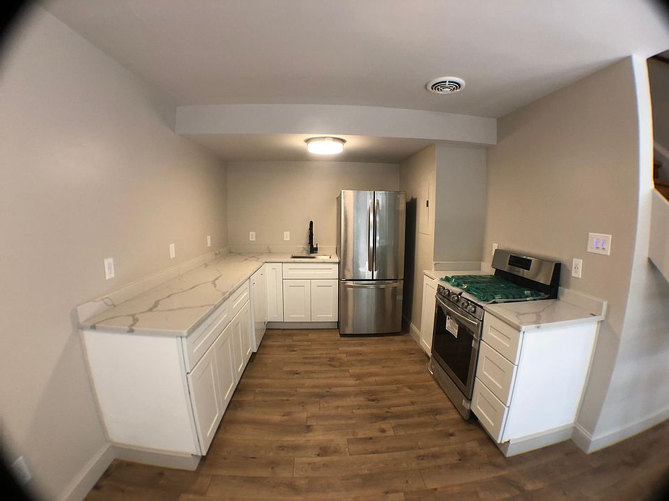 Modern, open kitchen with gorgeous countertops!