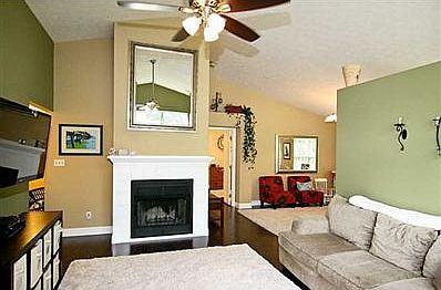 Family Room. Family room has high ceilings and beautiful new laminate WOOD flooring.