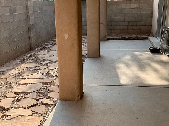 back covered patio/garden strip east to west
