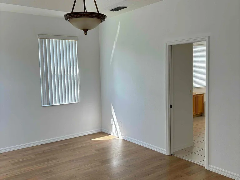 Master bedroom with beautiful ceiling inset and ensuite bathroom