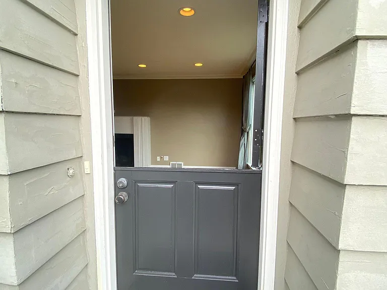 Front door opens halfway