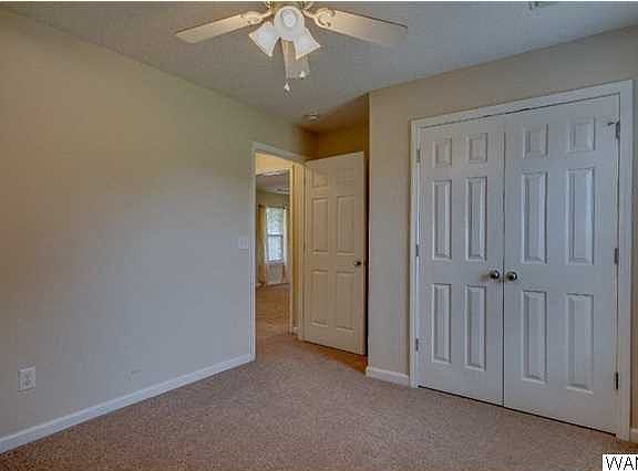 One of the additional bedrooms. Double closet for good storage space.