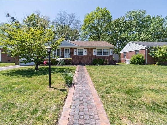 Look at this adorable brick pathway leading to your new front door!