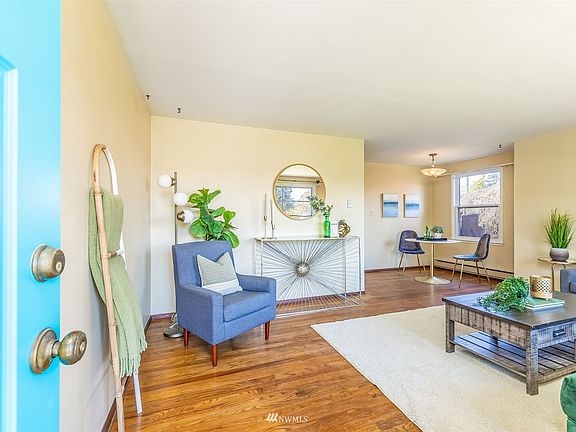 Door opens to large living room 