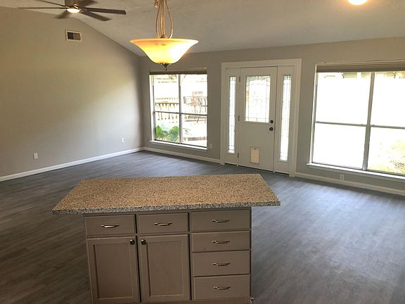 Large windows in the main living area let in lots of natural light
