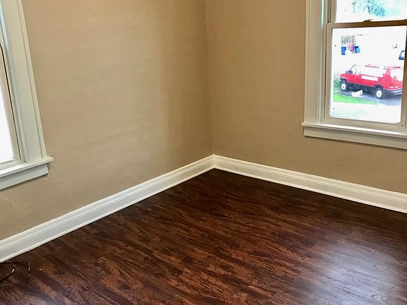 Large bedroom, lots of natural lighting.