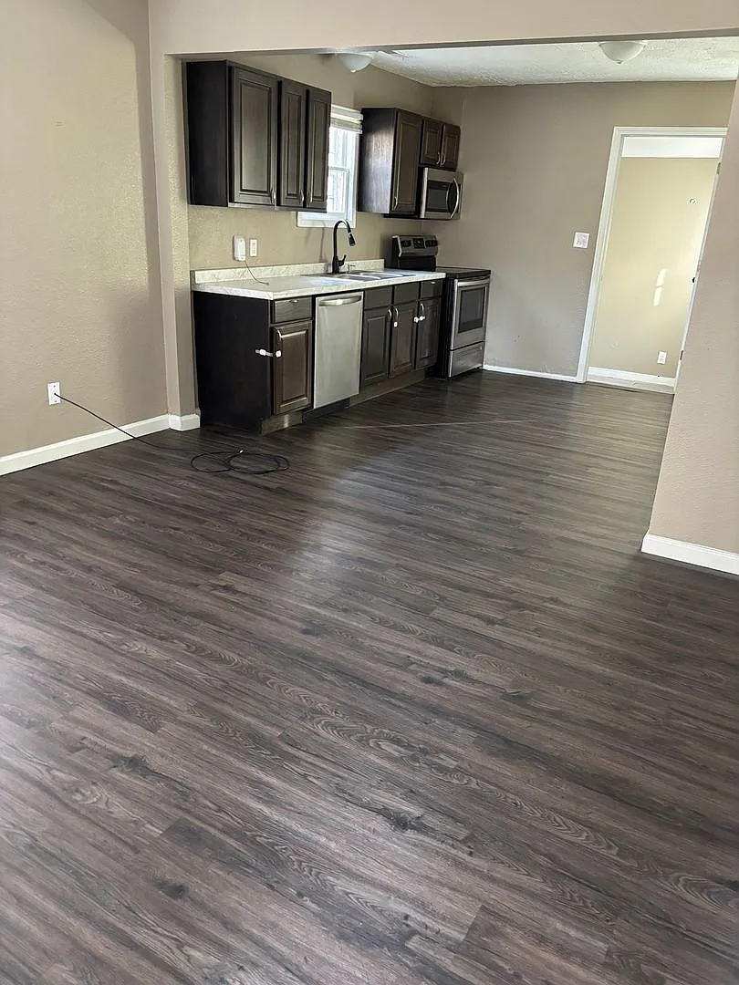 "Move-In Ready 2-Bedroom with Expansive Yard" — Photo 2