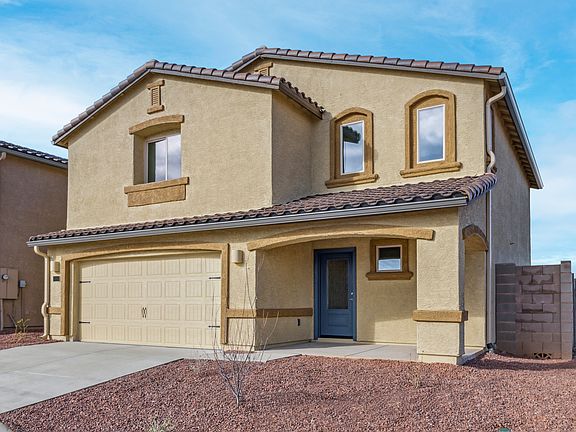 Angled exterior of the Snowflake with a two-car garage.