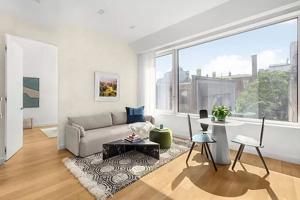 1st image of 32 E 1st St APT 7E