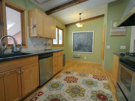 Gleaming hardwood flooring, and SS appliances.