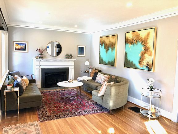 living room showing full 3 sectional couch divided