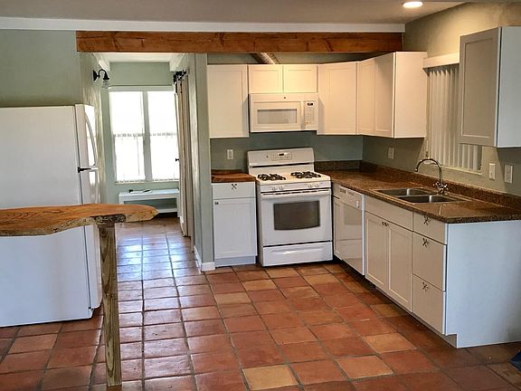 living area and kitchen