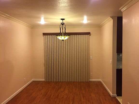 Dining room, viewing facing east, sliding door to covered pa