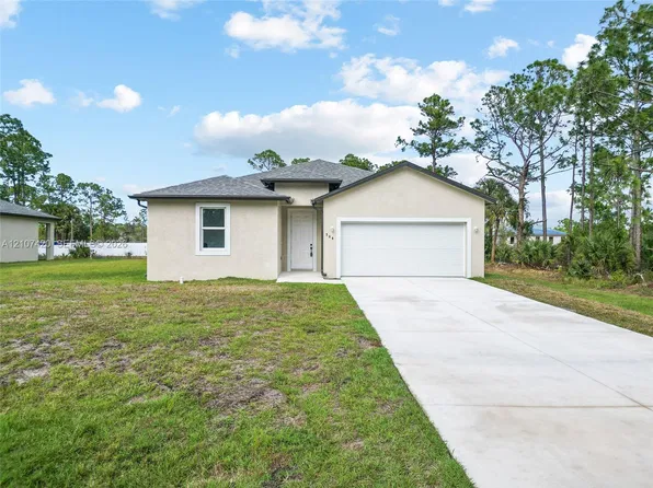 566 Woodview Dr, Lehigh Acres, FL 33972