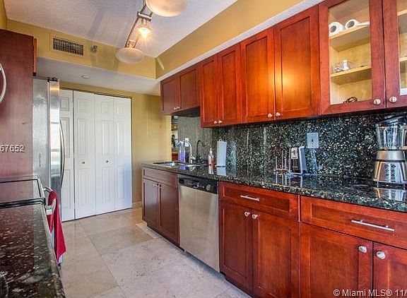 3rd image of 3500 Mystic Pointe Dr APT 806