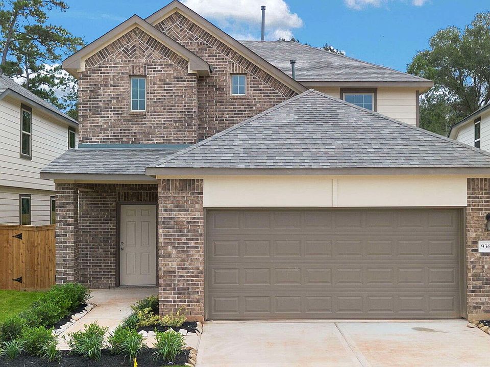 Welcome home to 9364 Hard Rock Road located in Stonebrooke and zoned to Conroe ISD.