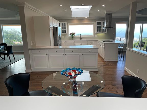 Kitchen table and view of kitchen