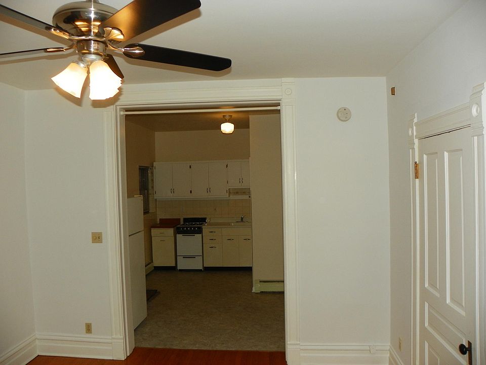 Main living /sleeping room, facing east.  Hardwood floor.