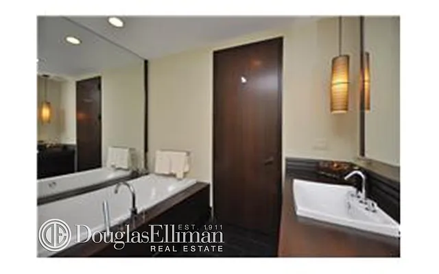 Sold by Douglas Elliman | media 13