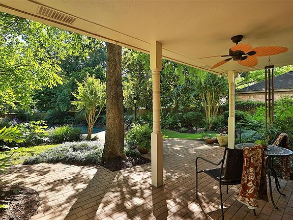 COVERED PATIO - Covered patio space is right outside the breakfast room and family room. It has ceiling fan and lighting on the corners. Great spot for your morning coffee.