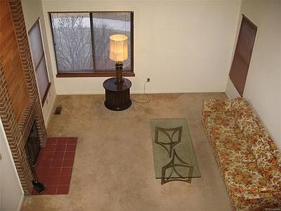 Large Living Area with wood burning fireplace
