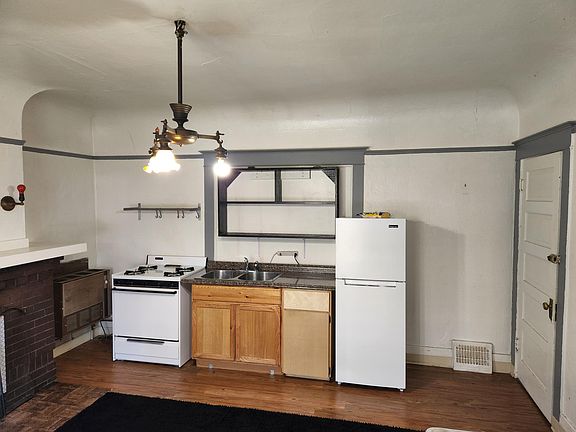 Kitchenette includes full size gas range and large fridge