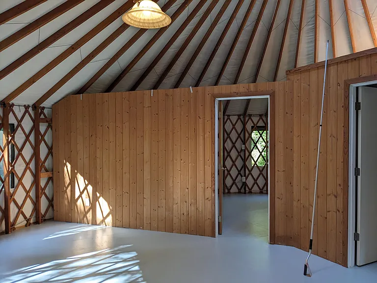 Living room, with doors to the bedroom and bathroom.