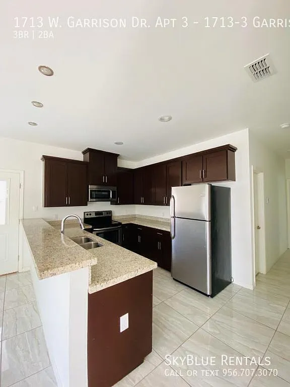 Building Photo - 1713 W Garrison Dr #3